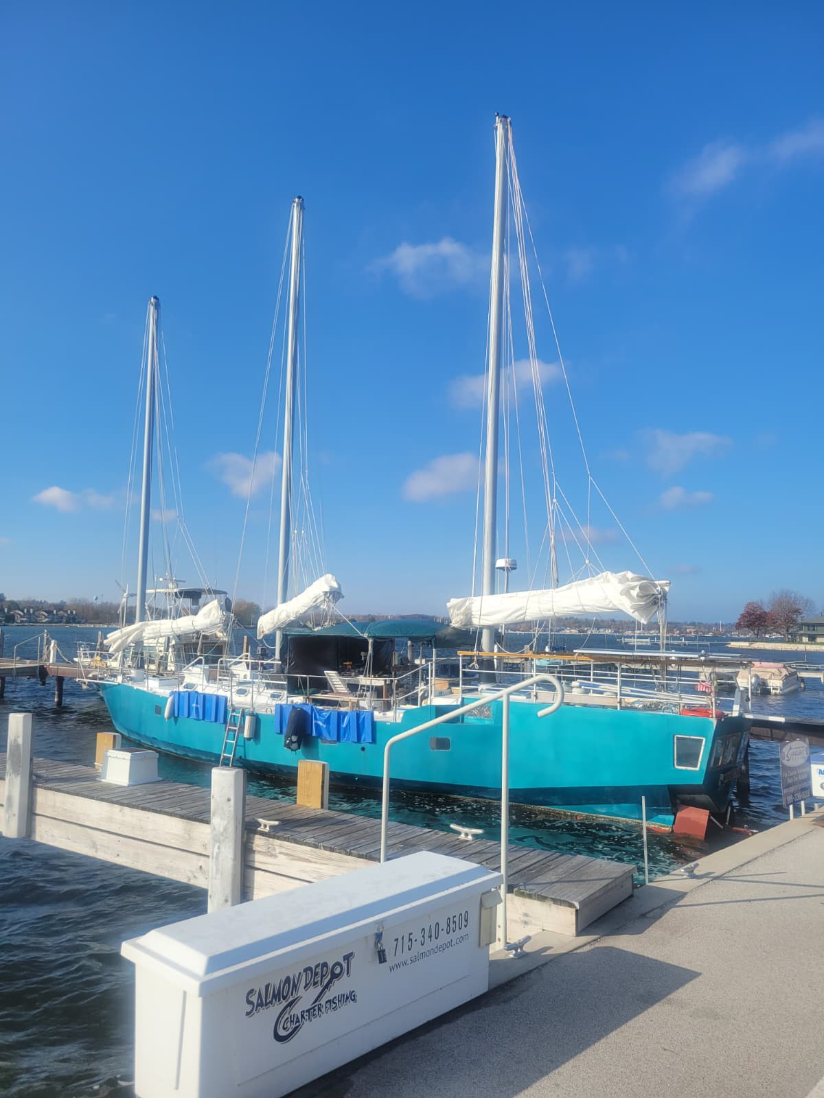 Deo Gratis prepared on shore with her three masts raised