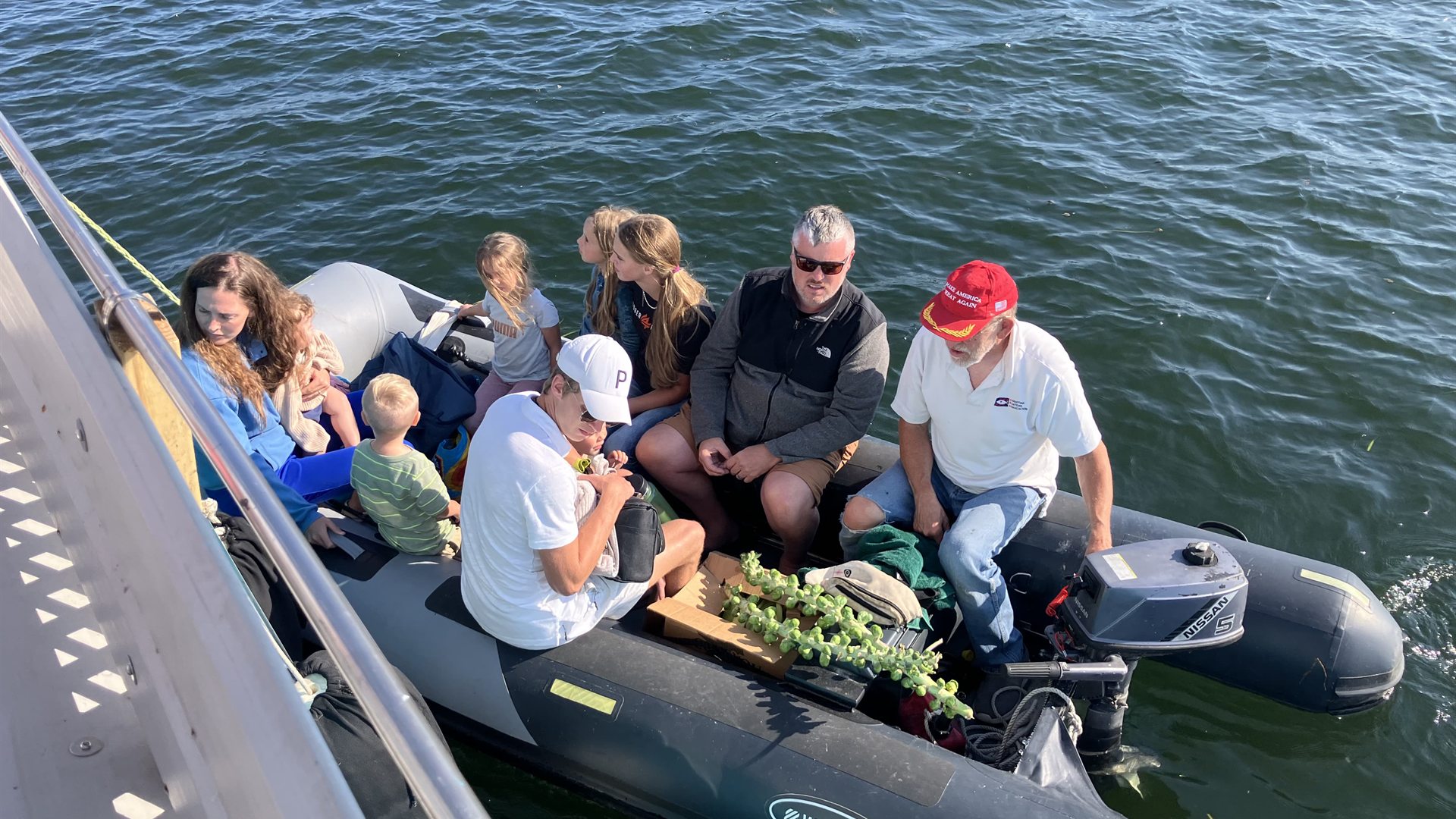 Crew gathered together on the water